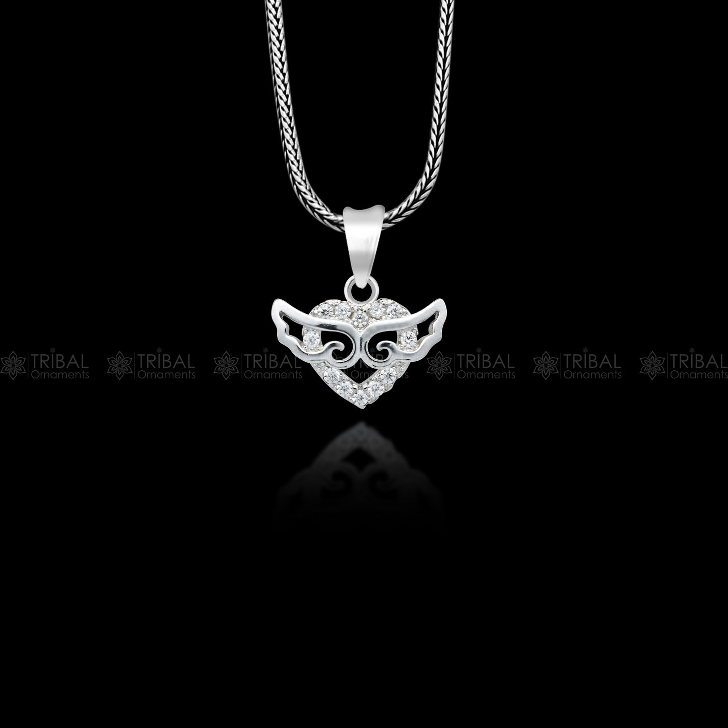 Handmade 925 Sterling silver pendant with a unique tribal design by TRIBAL ORNAMENTS, featuring intricate craftsmanship.