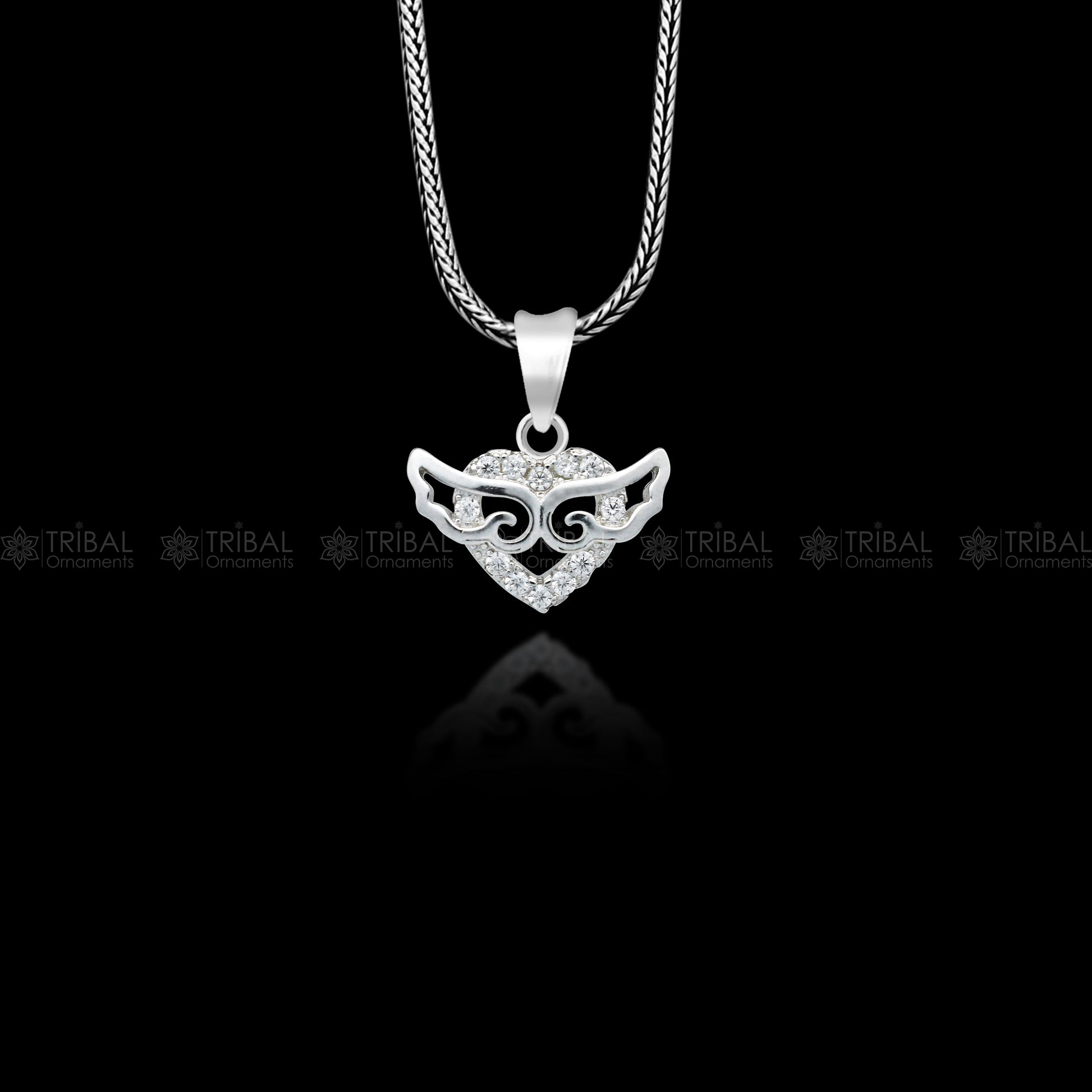Handmade 925 Sterling silver pendant with a unique tribal design by TRIBAL ORNAMENTS, featuring intricate craftsmanship.