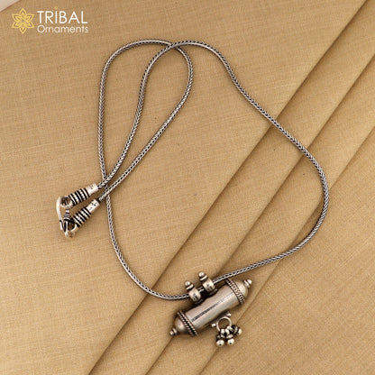 Sterling silver handmade amulet pendant with customized design, mantra box, and silver tabiz from Tribal Ornaments.
