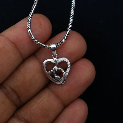 925 Sterling silver heart-shaped diamond pendant with intricate tribal design by TRIBAL ORNAMENTS.