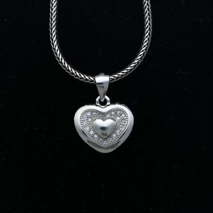925 Sterling silver heart-shaped diamond pendant from TRIBAL ORNAMENTS featuring a delicate and elegant design.