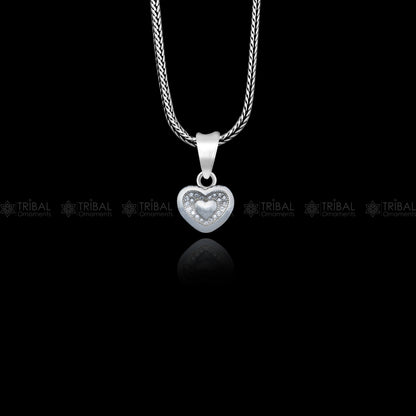 925 Sterling silver heart design diamond pendant by TRIBAL ORNAMENTS, showcasing a delicate heart-shaped pendant with sparkling diamonds.