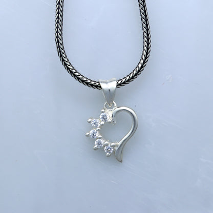 925 Sterling silver heart-shaped diamond pendant with intricate tribal design, crafted by TRIBAL ORNAMENTS.