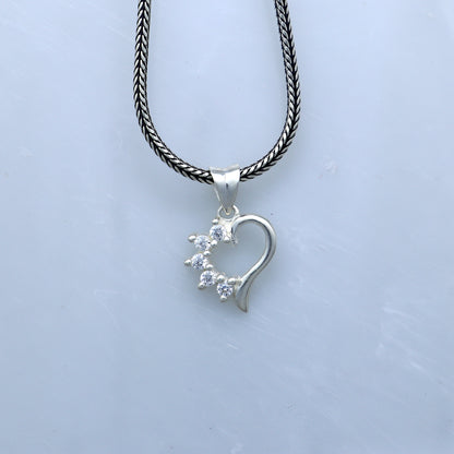 925 Sterling silver heart design diamond pendant by TRIBAL ORNAMENTS, featuring a delicate heart shape with embedded diamonds.