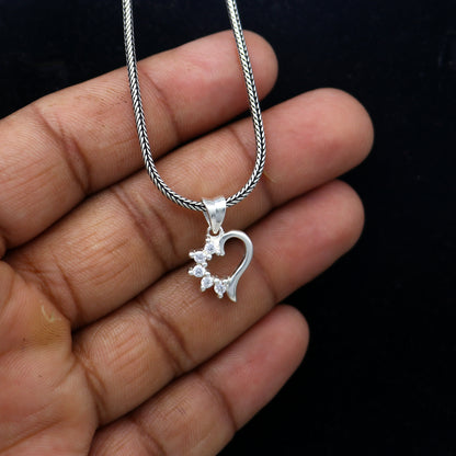 925 Sterling silver heart-shaped diamond pendant from Tribal Ornaments featuring a delicate design and sparkling diamonds.