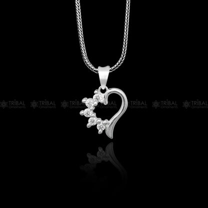 925 Sterling silver heart-shaped diamond pendant by TRIBAL ORNAMENTS featuring intricate tribal design.