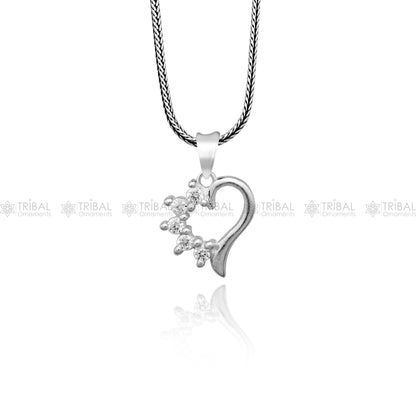 925 Sterling silver heart-shaped diamond pendant from Tribal Ornaments, showcasing a detailed design and sparkling diamonds.