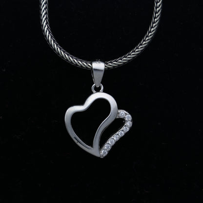 925 Sterling silver heart design diamond pendant by TRIBAL ORNAMENTS, featuring a delicate heart shape with sparkling diamonds.