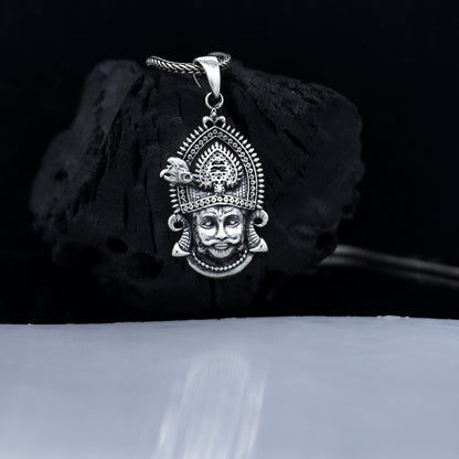 925 sterling silver Khatu Shyam pendant featuring Lord Krishna in tribal jewelry style, showcasing intricate divine tribal design.