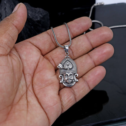 Sterling silver Khatu Shyam pendant featuring Lord Krishna, tribal jewelry design, detailed craftsmanship, and divine spiritual symbolism.
