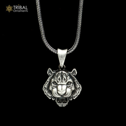 925 sterling silver lion face pendant with chain from TRIBAL ORNAMENTS, showcasing tribal jewelry style and detailed lion design.
