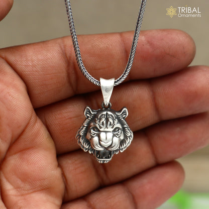 Sterling silver lion face pendant with chain, tribal jewelry by TRIBAL ORNAMENTS, detailed tribal design on the pendant.