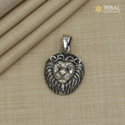 Sterling silver lion face pendant with chain, tribal jewelry design, crafted by TRIBAL ORNAMENTS, showcasing detailed tribal lion motif.