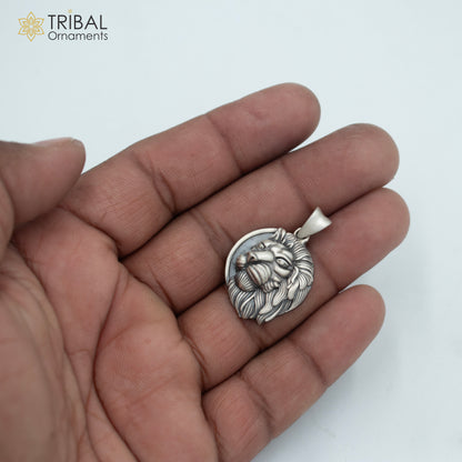 Sterling silver lion head pendant with chain, tribal jewelry by TRIBAL ORNAMENTS, showcasing detailed tribal design and craftsmanship.