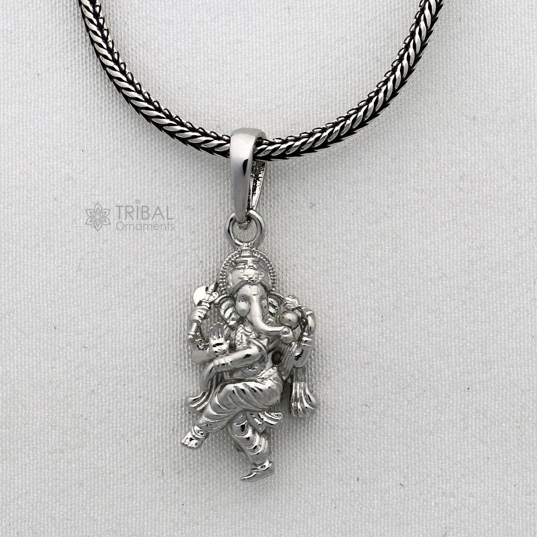 925 sterling silver Lord Ganesha dancing pendant for unisex jewelry, featuring intricate tribal design and handmade craftsmanship.