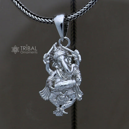Sterling silver Lord Ganesha dancing pendant, unisex handmade jewelry by TRIBAL ORNAMENTS, detailed traditional design.