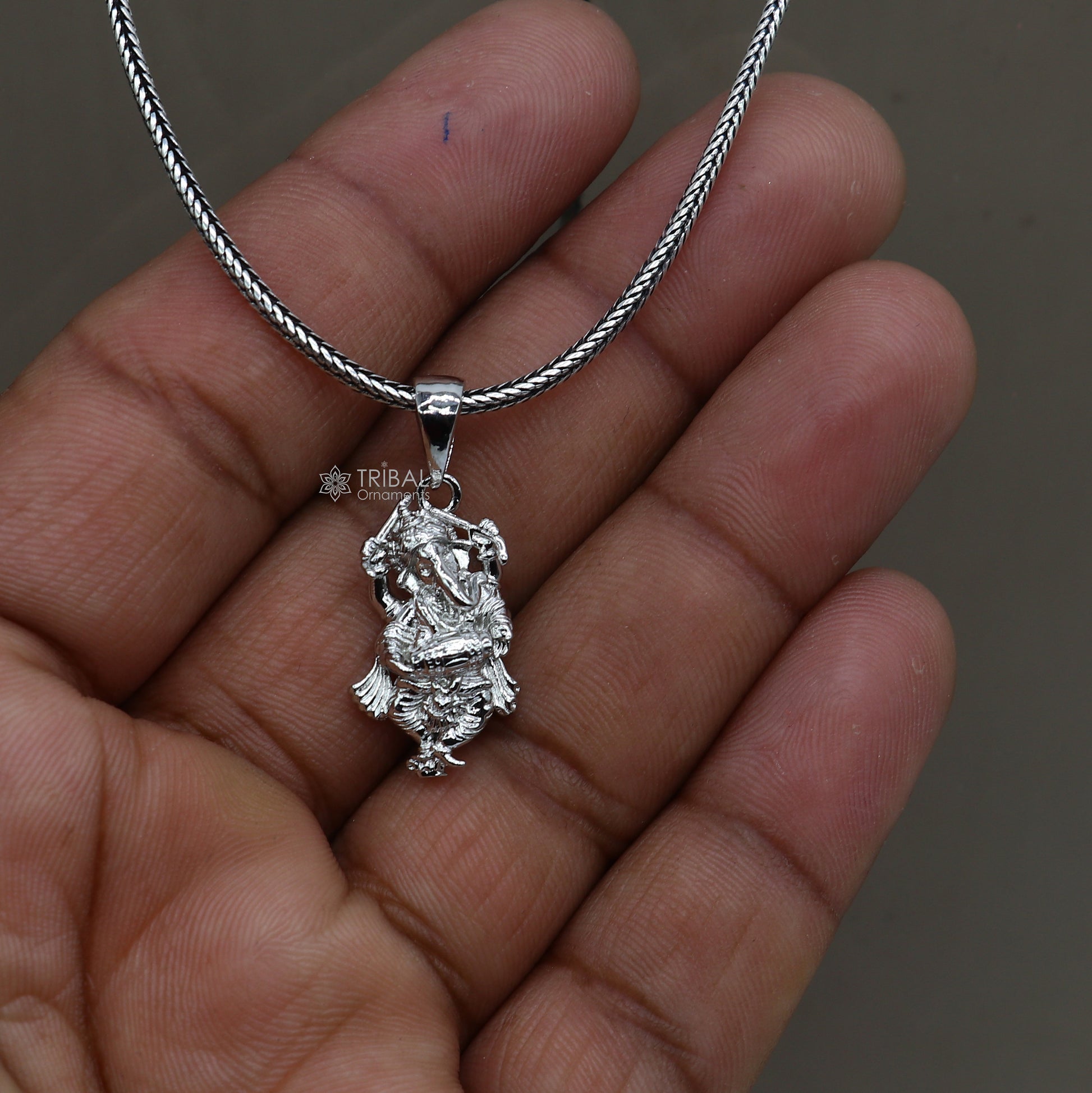 Sterling silver Lord Ganesha dancing pendant, unisex tribal jewelry, intricate handmade design for necklace or gift.