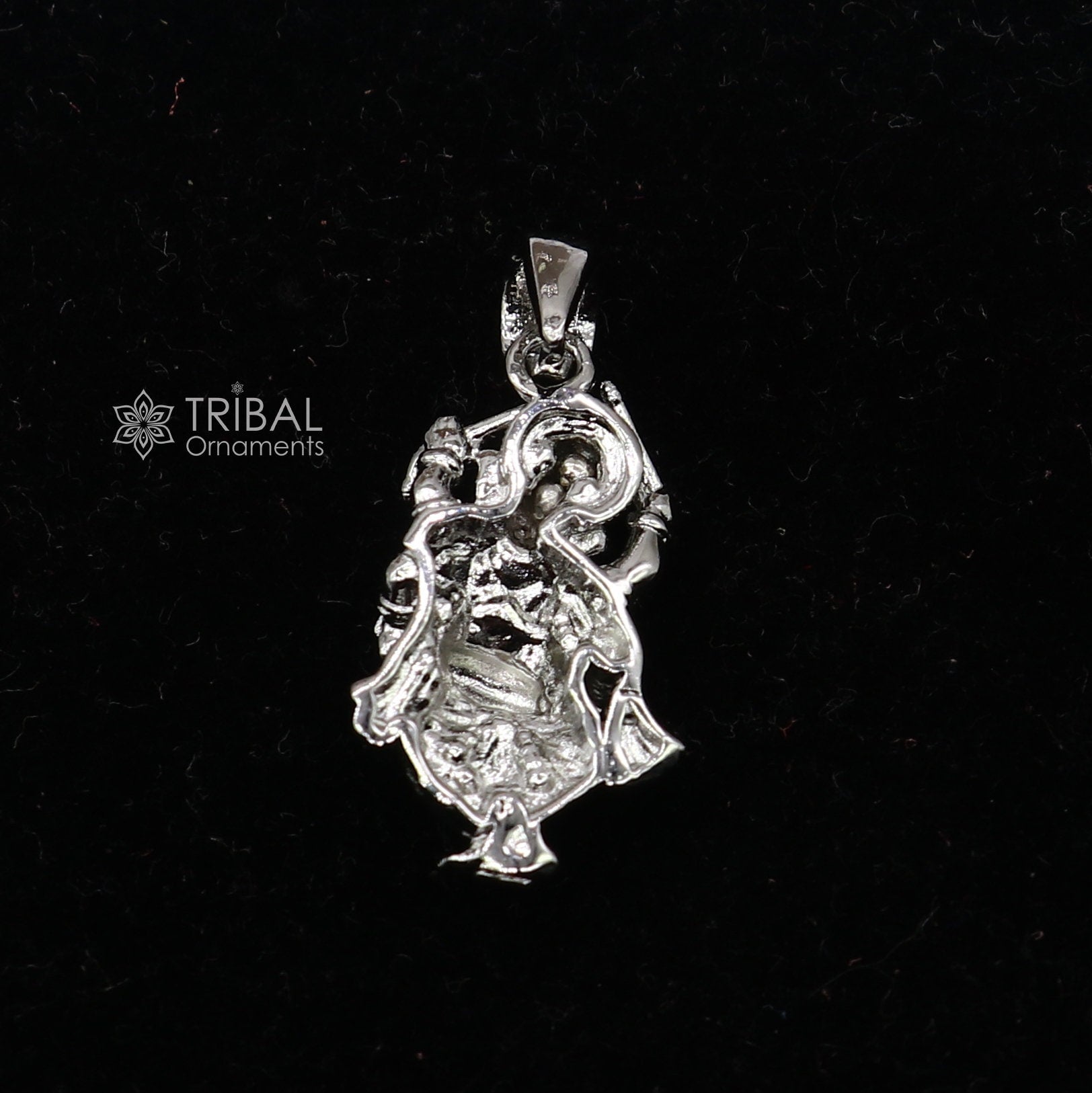 Sterling silver Lord Ganesha dancing pendant by Tribal Ornaments, unisex jewelry with intricate handmade design.