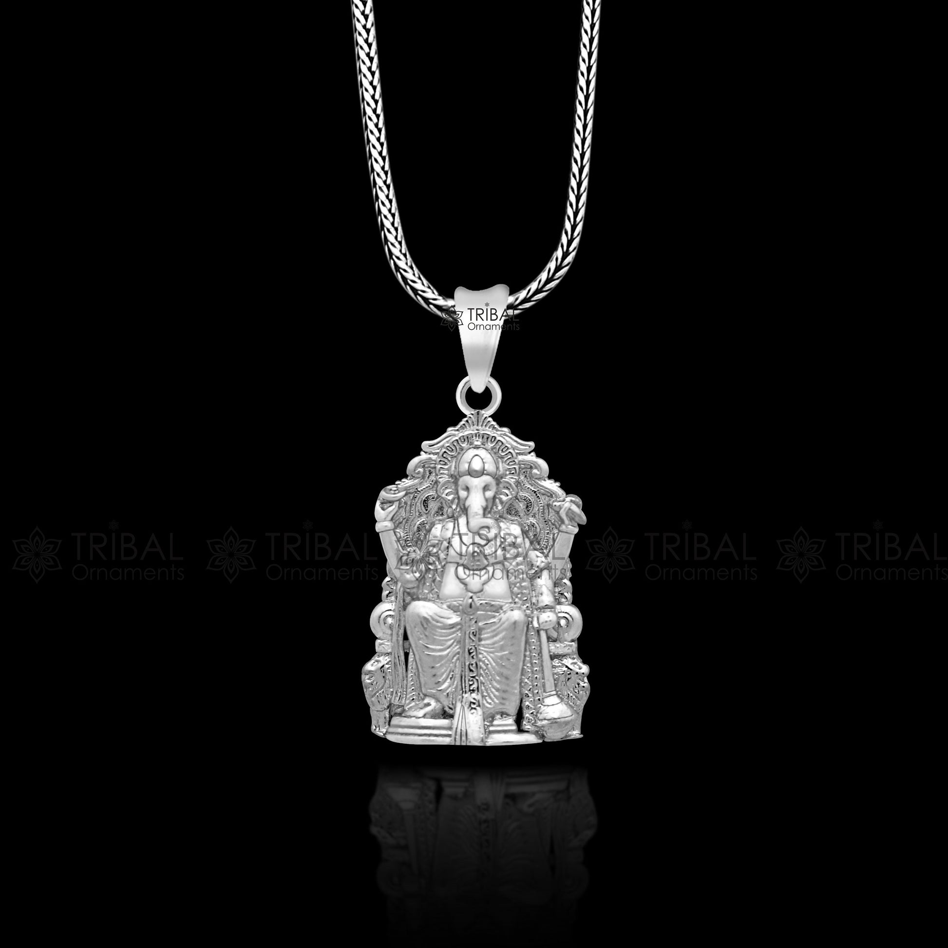 Unisex 925 sterling silver Lord Ganesha pendant with intricate tribal design, handmade jewelry by TRIBAL ORNAMENTS.