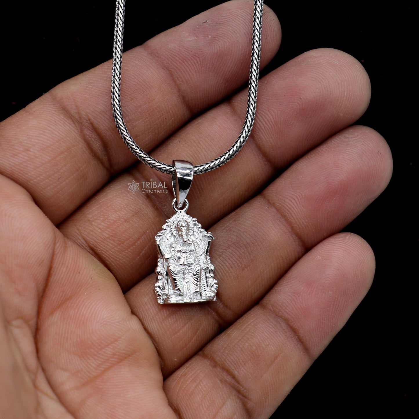 Unisex 925 sterling silver Lord Ganesha pendant with intricate tribal design, handmade jewelry by TRIBAL ORNAMENTS.