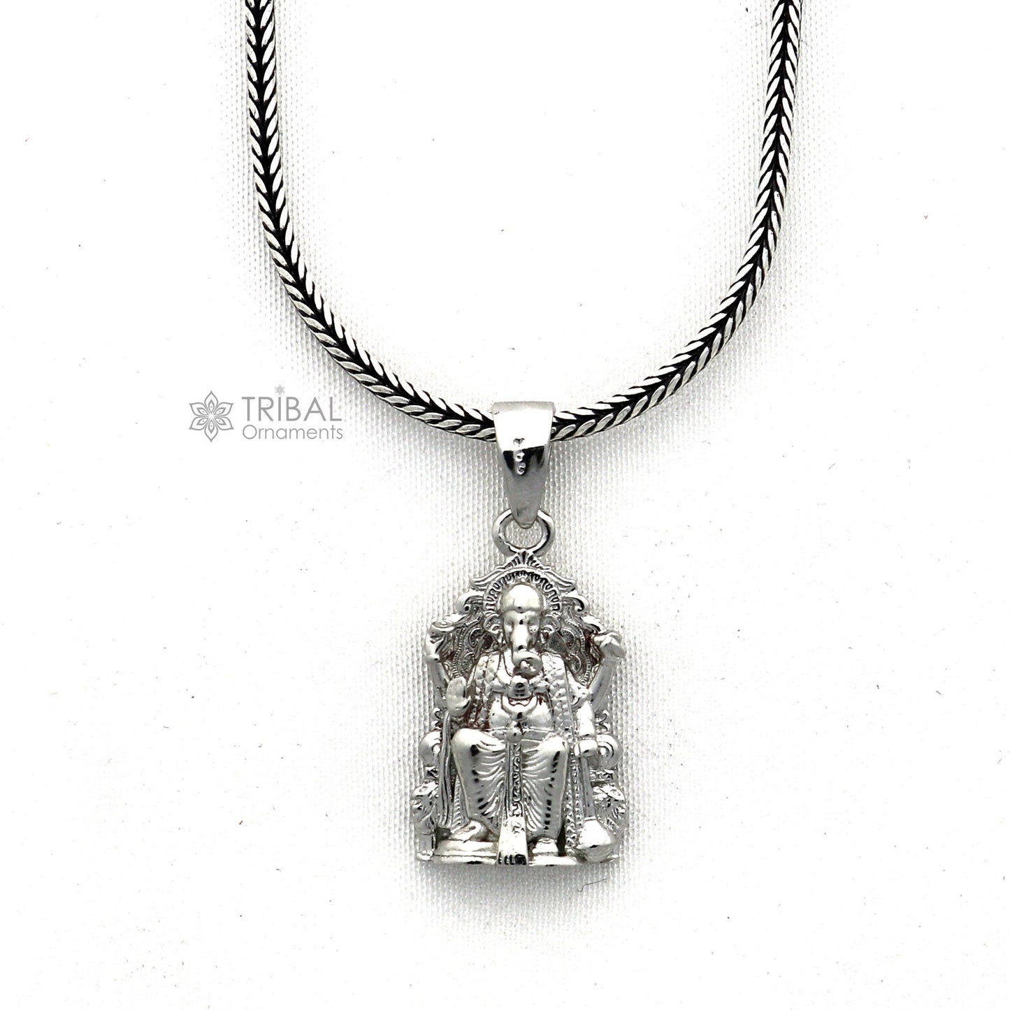 Sterling silver Lord Ganesha pendant from TRIBAL ORNAMENTS, unisex jewelry featuring a detailed, handmade Ganesha design.