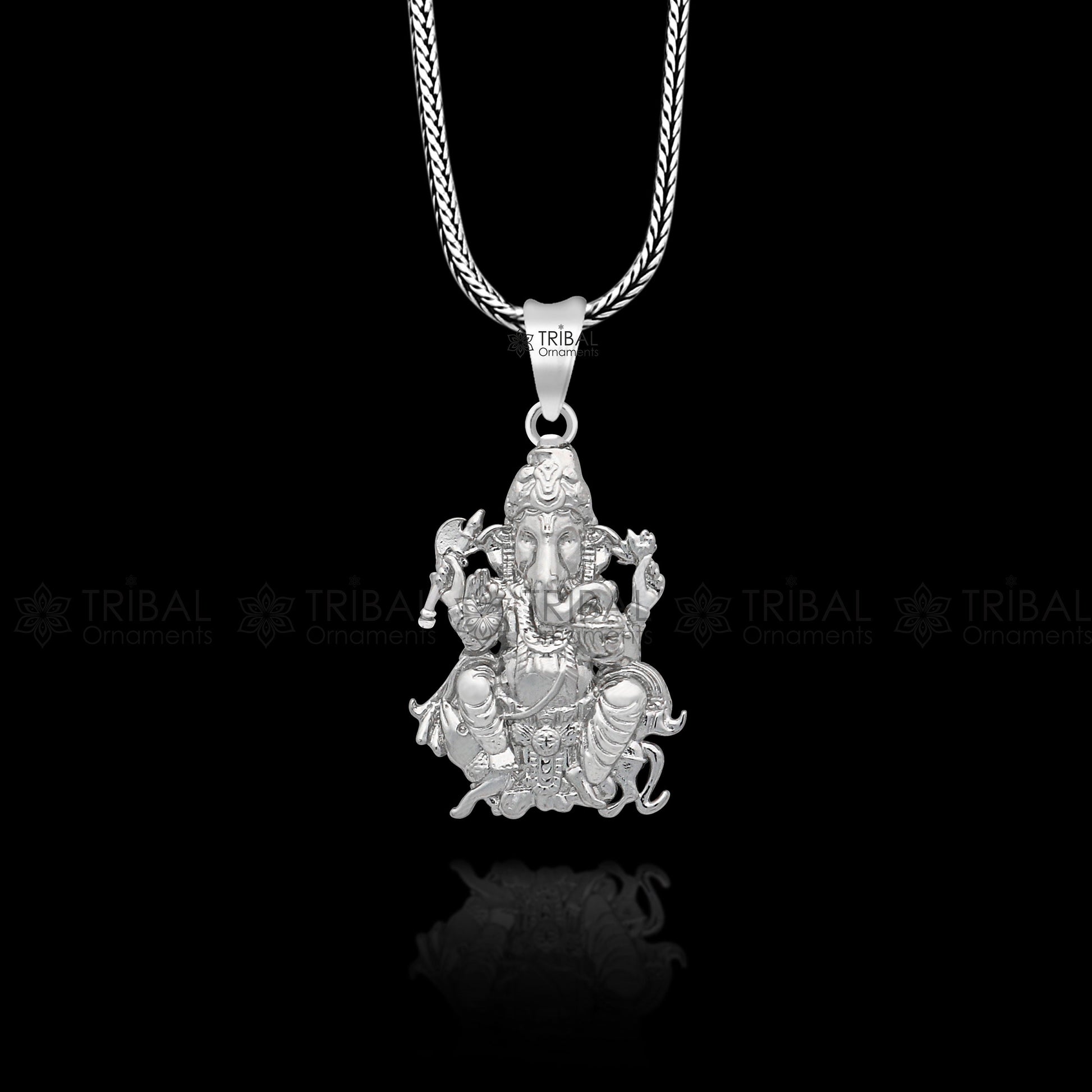 Unisex 925 sterling silver Lord Ganesha pendant with intricate tribal design, handmade jewelry by TRIBAL ORNAMENTS.