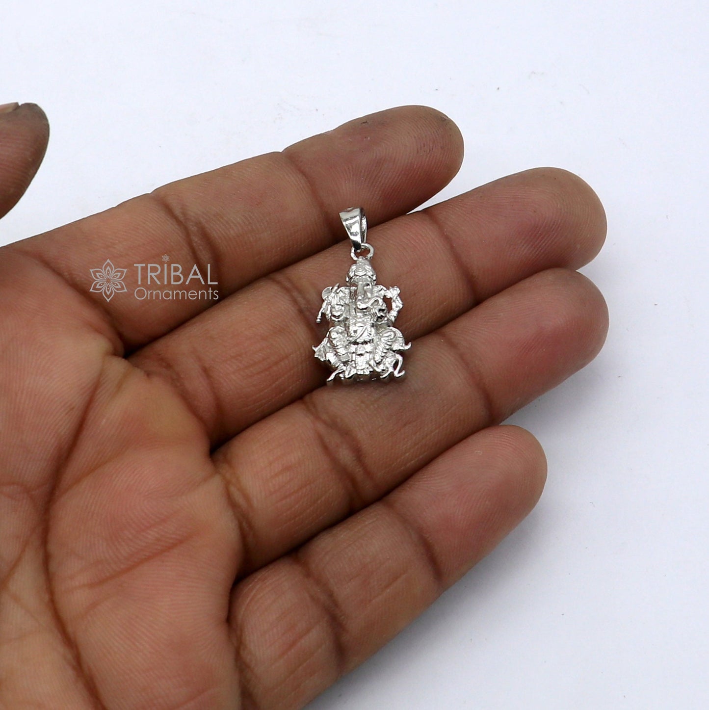 Sterling silver Lord Ganesha pendant from Tribal Ornaments, unisex jewelry with intricate handcrafted design for necklaces.