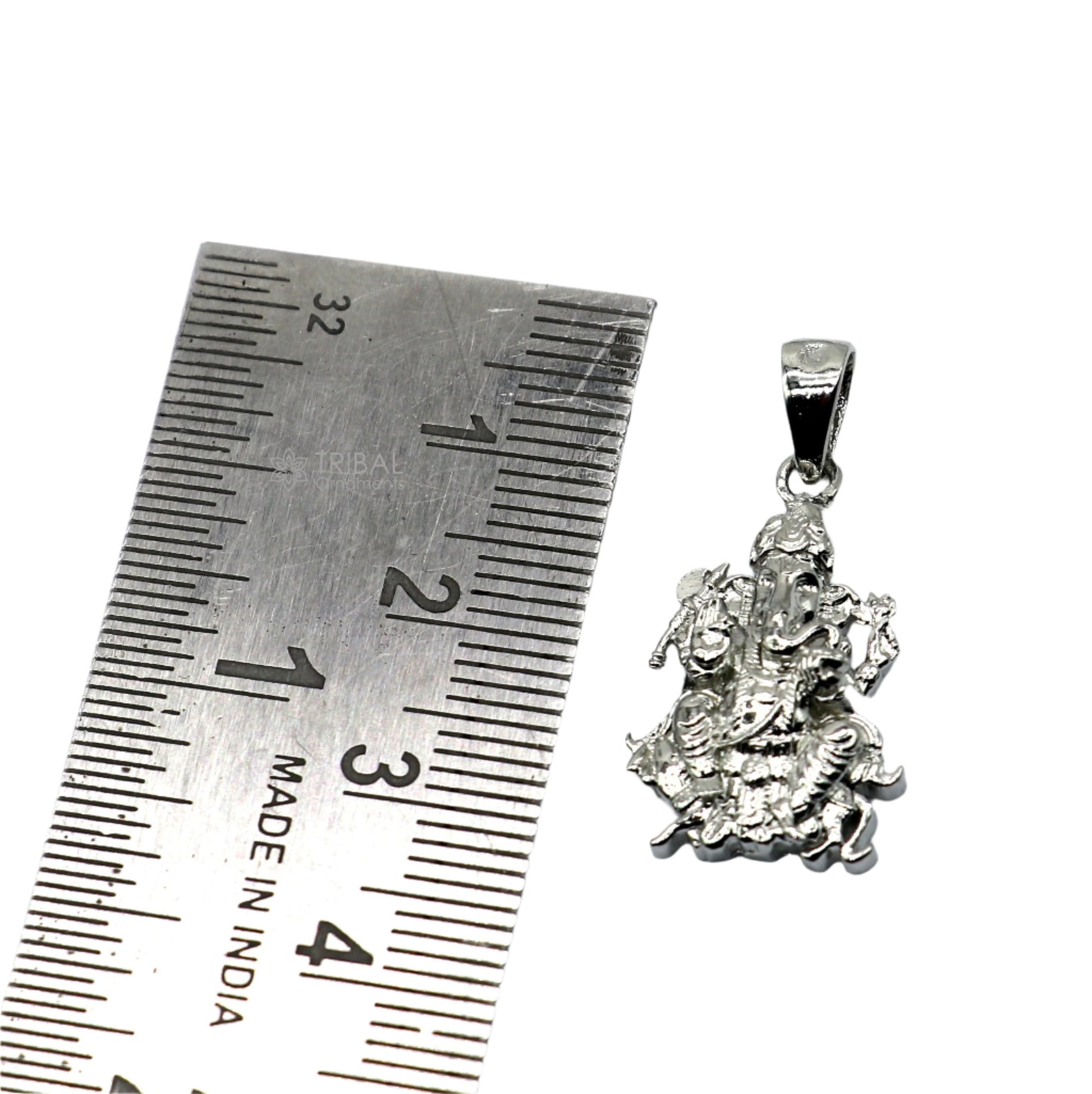 925 sterling silver Lord Ganesha pendant from Tribal Ornaments, unisex jewelry featuring a detailed, handmade Ganesha design.