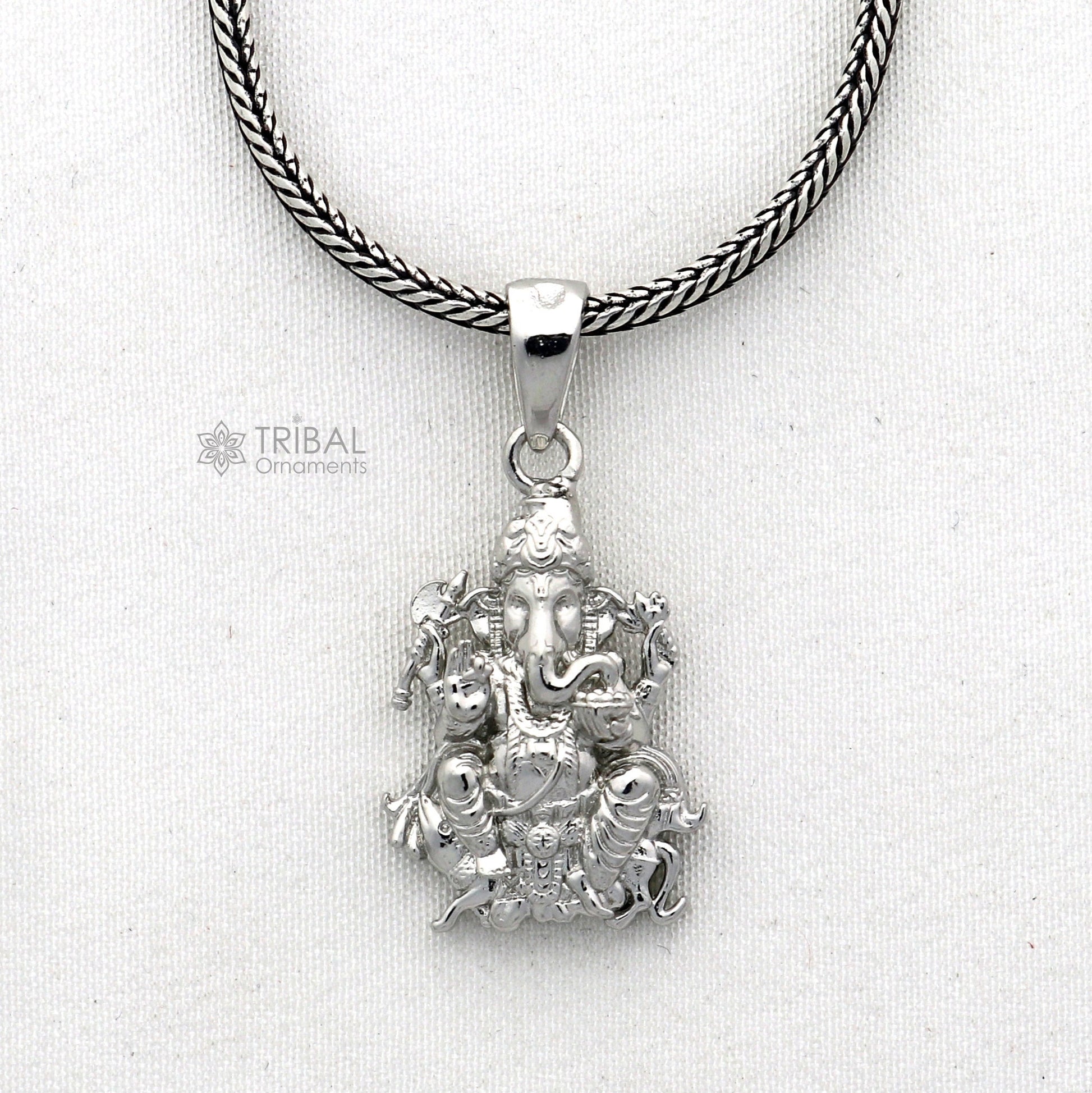 Sterling silver Lord Ganesha pendant, unisex jewelry by Tribal Ornaments, showcasing a detailed handmade design for necklaces.