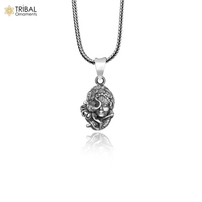 925 sterling silver Lord Krishna pendant from tribal jewelry collection, featuring intricate tribal design and religious symbolism.