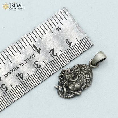925 sterling silver Lord Krishna pendant from Tribal Ornaments, featuring tribal-style jewelry design.