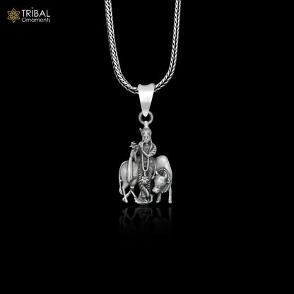 925 sterling silver Lord Krishna with cow pendant on chain, tribal jewelry featuring detailed religious and tribal motifs.