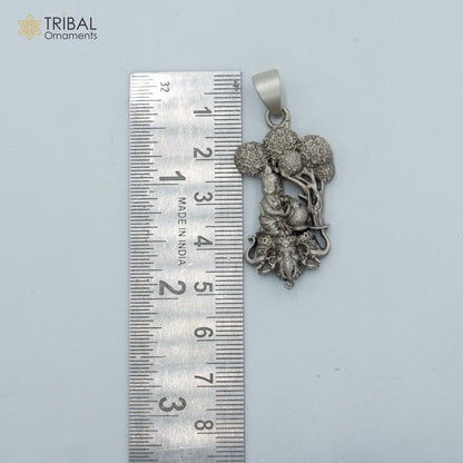 Sterling silver Lord Krishna pendant with tree face elephant design, attached to a chain, tribal jewelry by Tribal Ornaments.