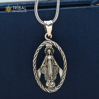 Sterling silver Mother Mary pendant with chain, tribal jewelry style, detailed religious figure, handcrafted tribal ornament design.