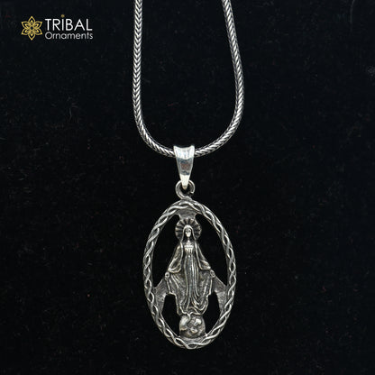Sterling silver Mother Mary pendant with chain, tribal jewelry style, featuring detailed religious design.