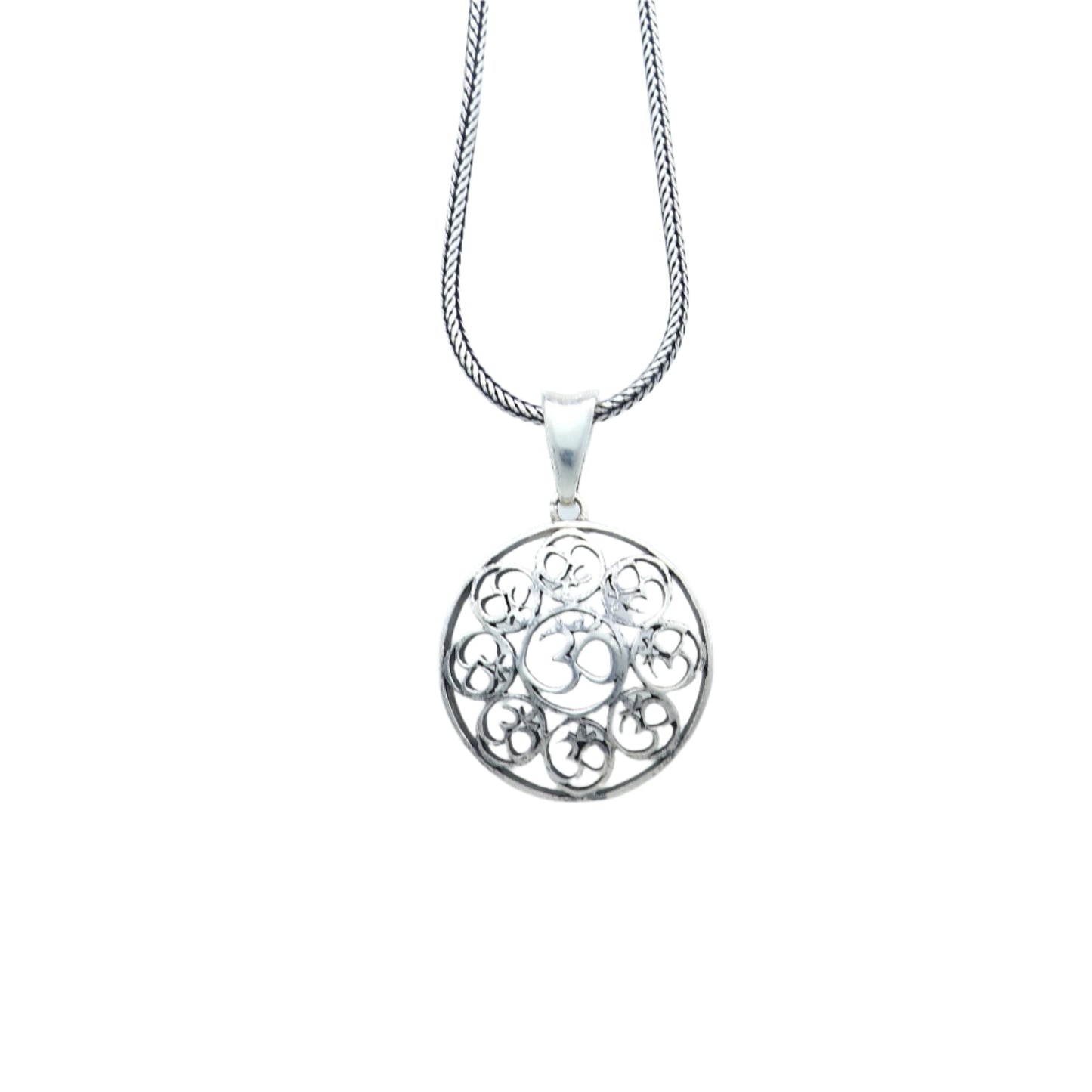 925 Sterling silver Om pendant featuring the Om mantra, crafted by TRIBAL ORNAMENTS with intricate detailing.
