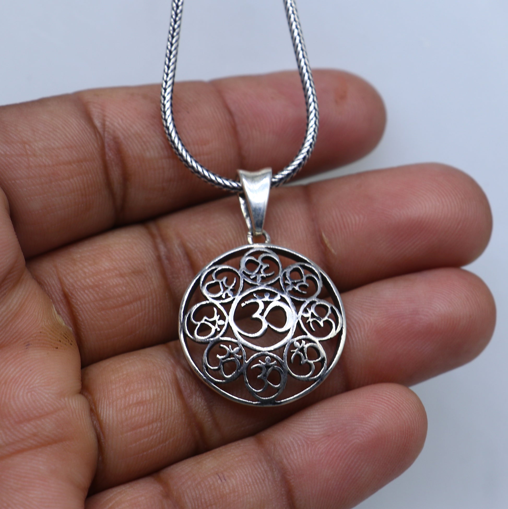 925 Sterling silver Om mantra pendant featuring intricate tribal ornament design, crafted by Tribal Ornaments.