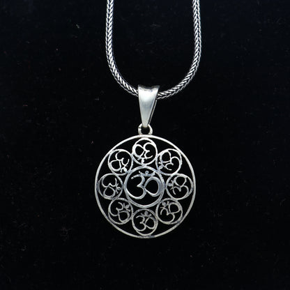 925 Sterling silver Om pendant featuring the Om mantra design, crafted by Tribal Ornaments, with intricate detailing.