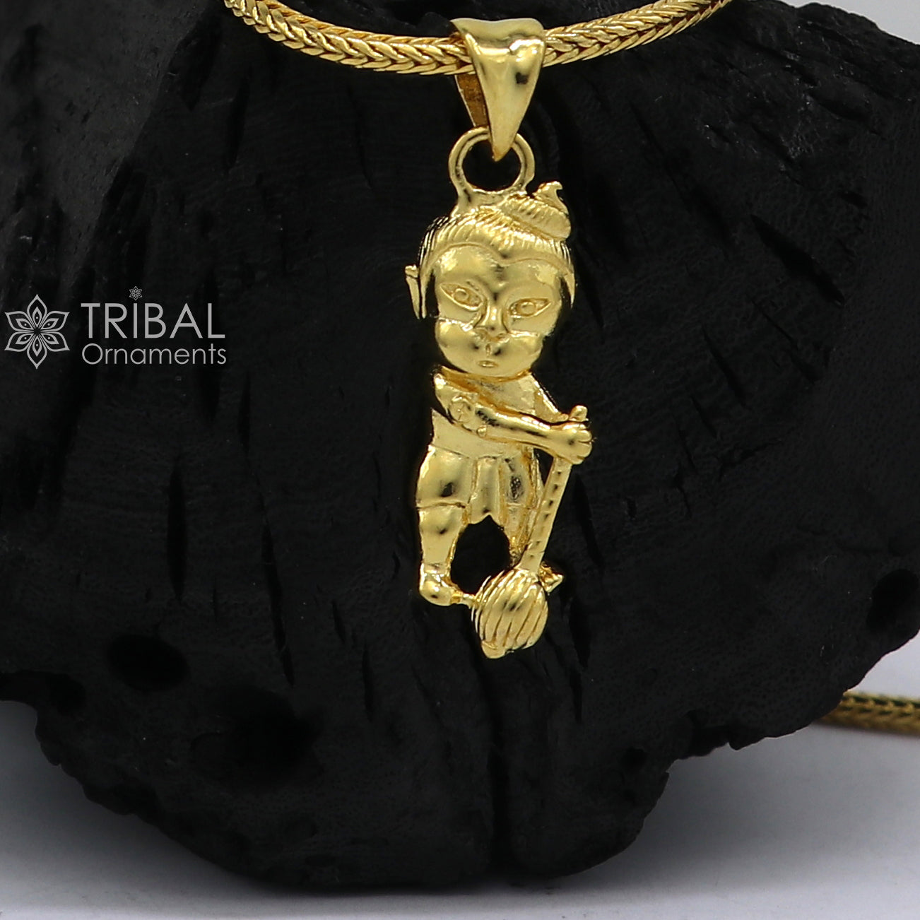 Sterling silver Lord Bal Hanuman pendant with gold polish, handcrafted tribal design, stylish and detailed jewelry piece.