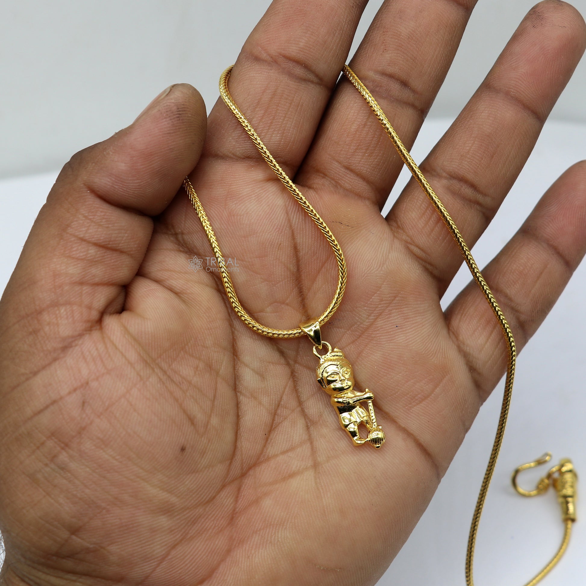 Sterling silver Lord Bal Hanuman pendant with gold polish, handmade tribal design, stylish jewelry by TRIBAL ORNAMENTS.