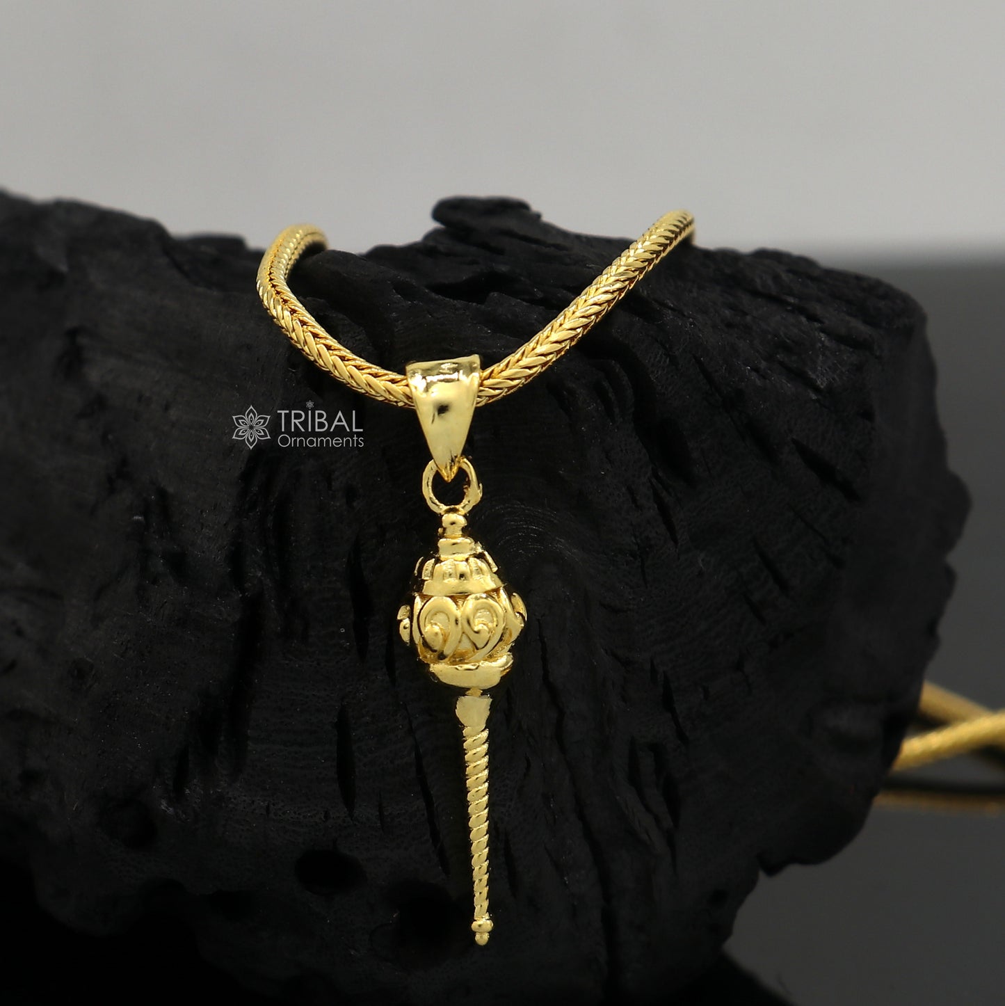 Sterling silver Lord Hanuman mace pendant with gold polish, handmade tribal design, featuring a traditional gadā and sakha motifs.