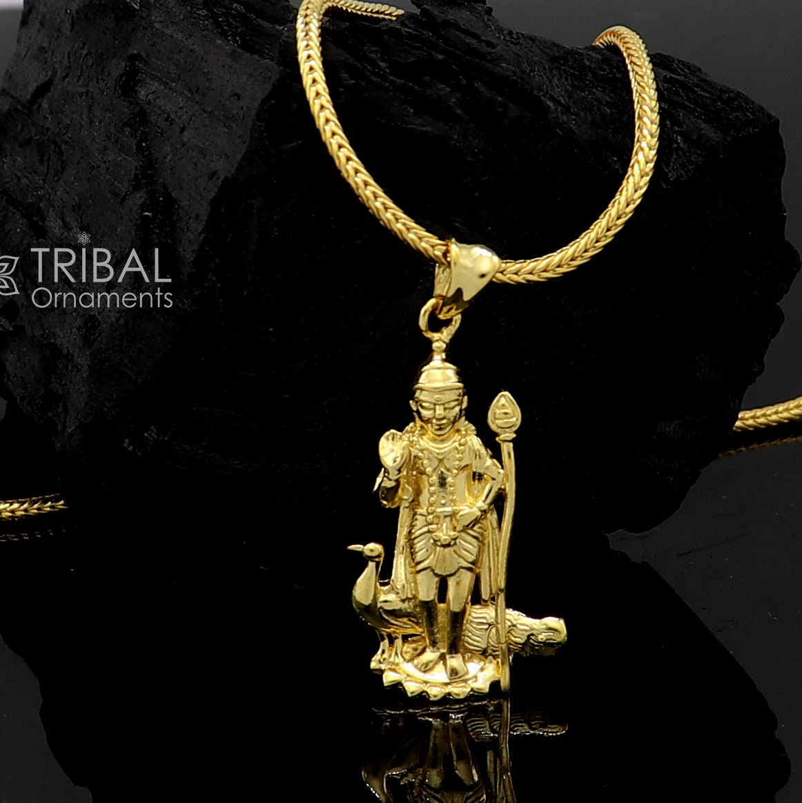 Sterling silver and gold polished Mughan Kartikeya pendant from Tribal Ornaments, handcrafted Lord Murugan jewelry.
