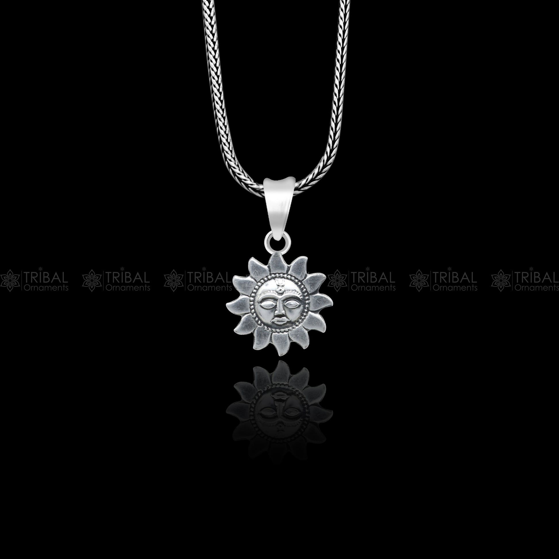 Sterling silver Sun (Surya) pendant from Tribal Ornaments, showcasing a detailed tribal sun design in 925 silver.