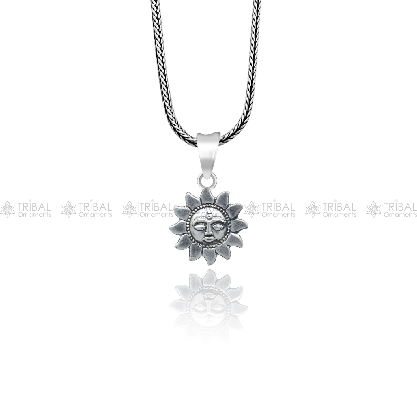 925 Sterling silver Sun (Surya) pendant from Tribal Ornaments, featuring detailed sun design on a polished silver pendant.