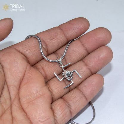 Sterling silver Swastik and Ganesha pendant with chain, tribal jewelry by TRIBAL ORNAMENTS, featuring intricate design details.