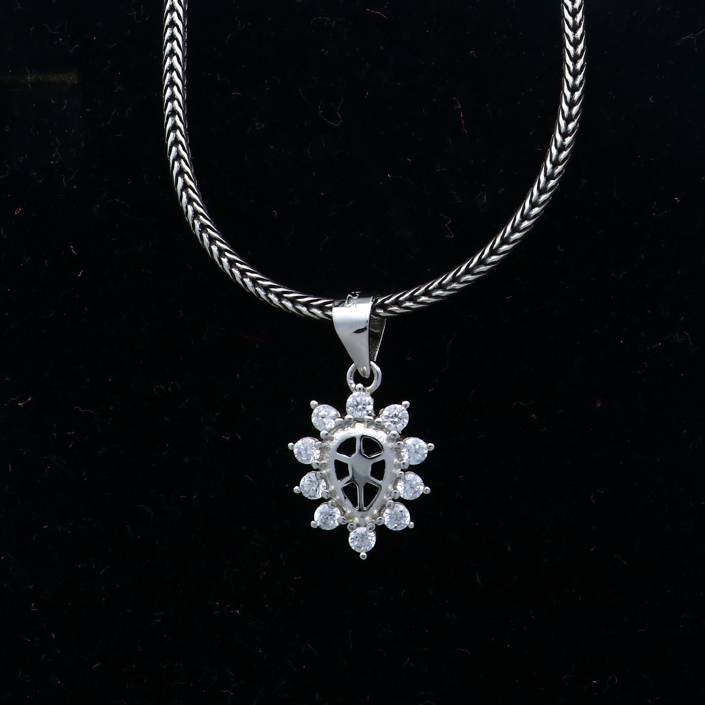 925 Sterling silver diamond pendant with unique tribal design, crafted by TRIBAL ORNAMENTS, featuring intricate details and sparkling diamonds.