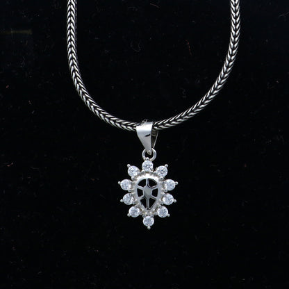 925 Sterling silver diamond pendant with unique tribal design, crafted by TRIBAL ORNAMENTS, featuring intricate details and sparkling diamonds.
