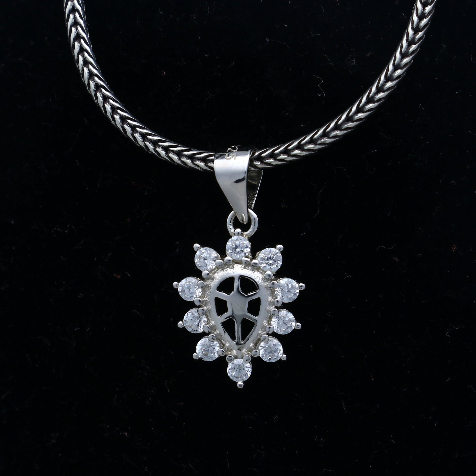 925 Sterling silver diamond pendant with a unique tribal design, featuring intricate craftsmanship by TRIBAL ORNAMENTS.