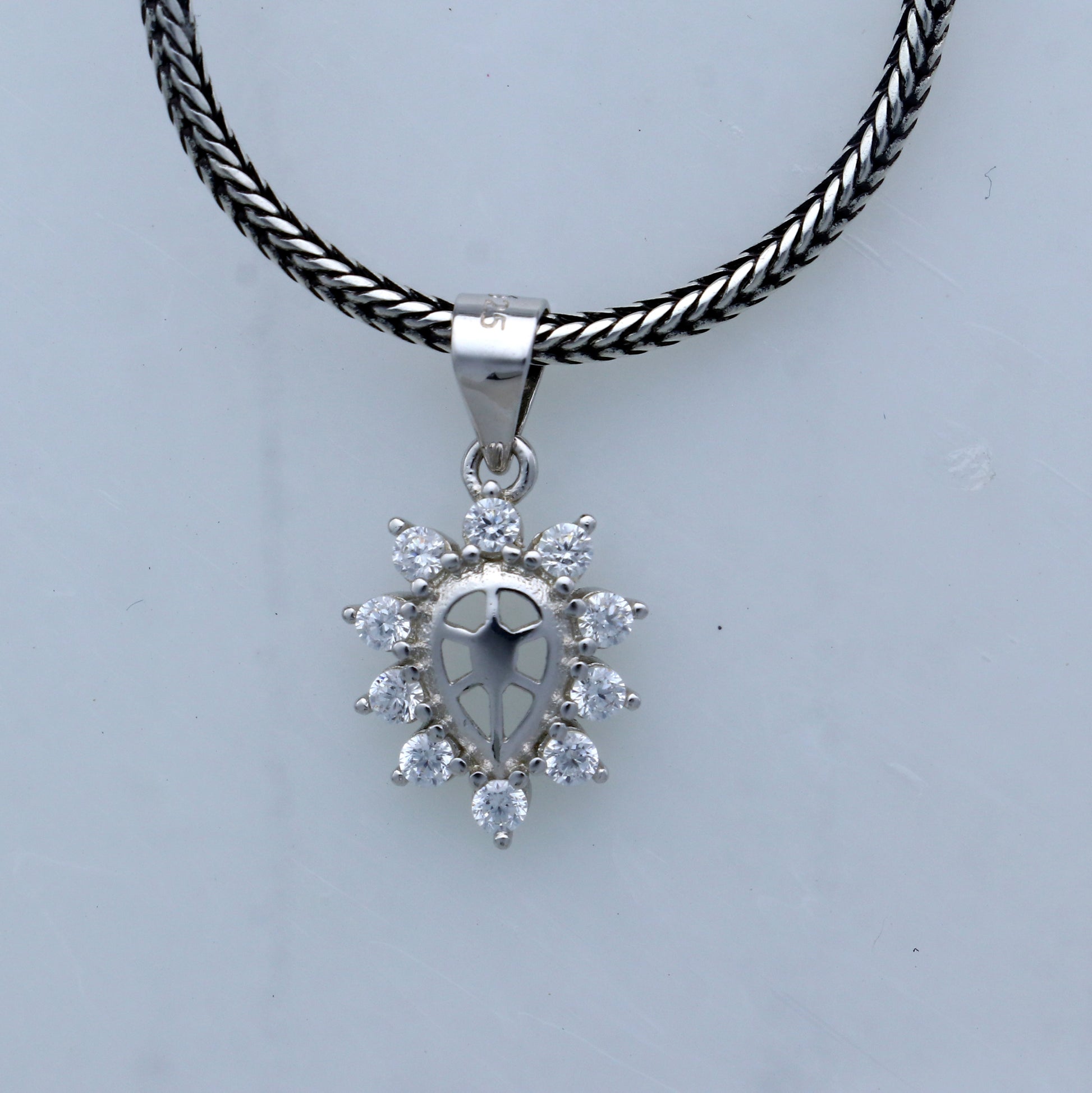 925 Sterling silver diamond pendant with unique tribal design, crafted by TRIBAL ORNAMENTS.