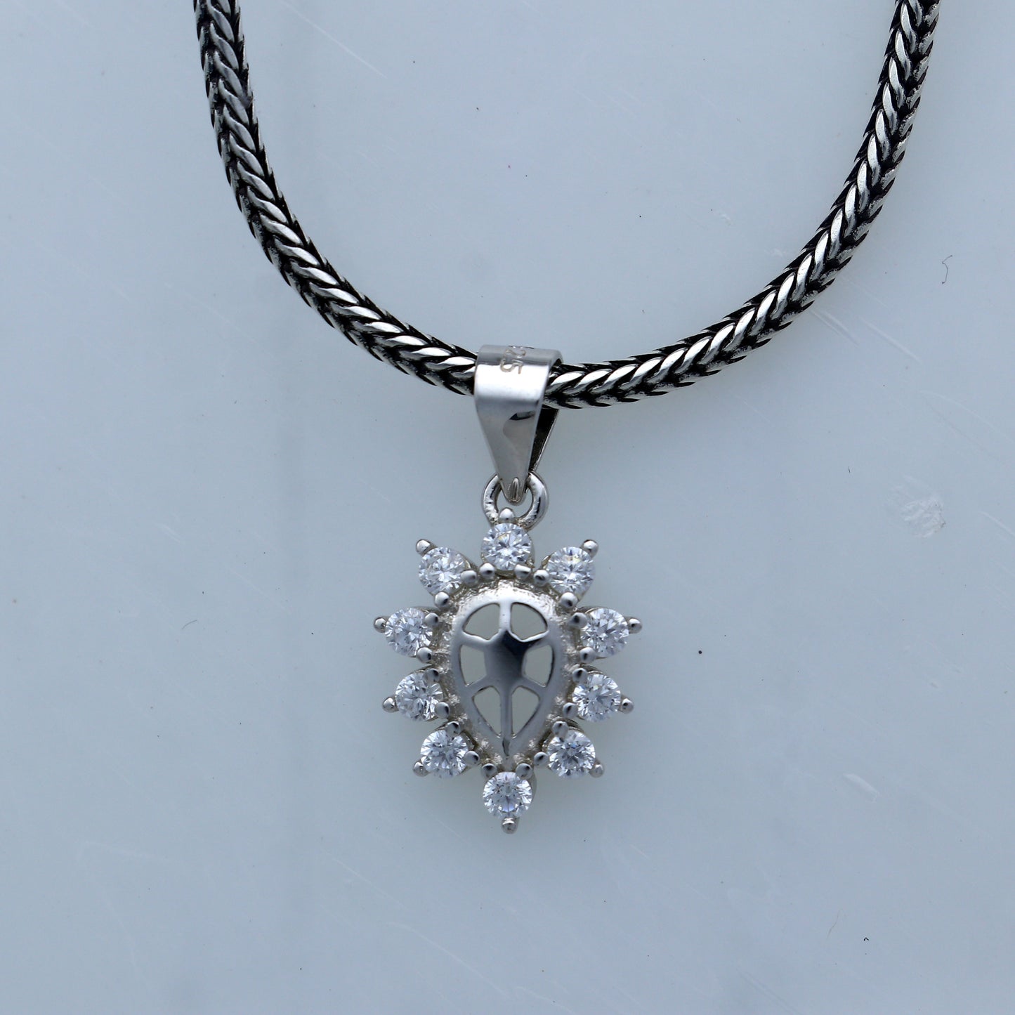 925 Sterling silver diamond pendant with unique tribal design from TRIBAL ORNAMENTS, featuring intricate craftsmanship.